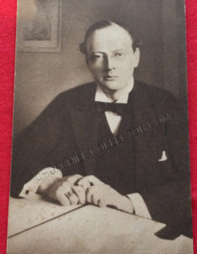 Undated Sepia Postcard of a Young Churchill at his Desk.