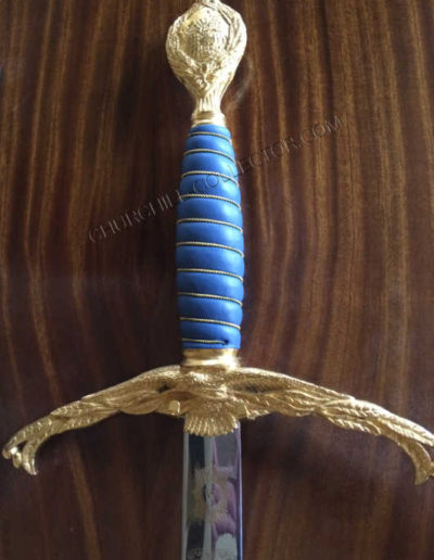 Sword with gilt cross guard & blue leather grip