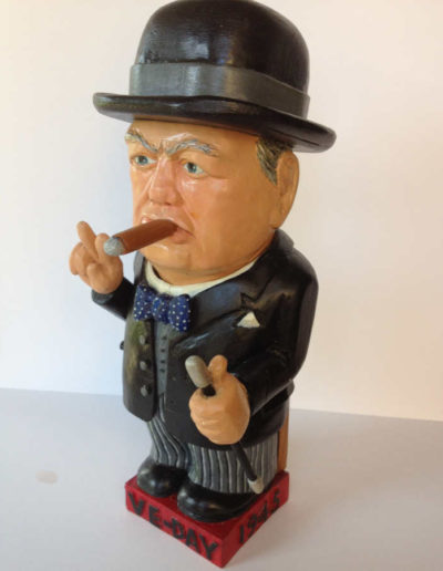 CARVED MECHANICAL WOOD FIGURE: WINSTON CHURCHILL CELEBRATING VE DAY