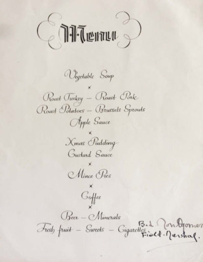 Inside page: Christmas Dinner Menu signed by F. M. Montgomery. Christmas 1945