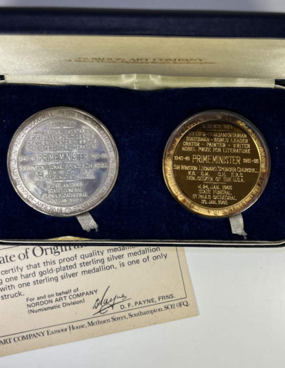 Cased pair of silver medals, one gilt. With COA