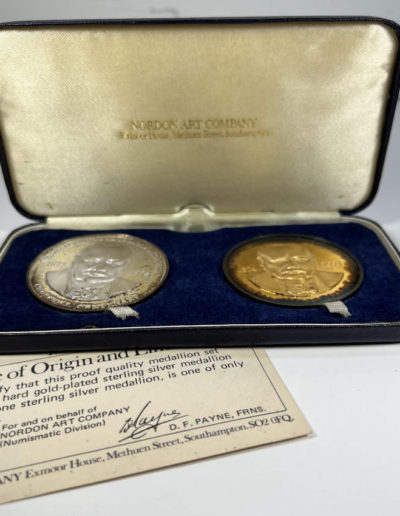 Cased pair of silver medals, one gilt