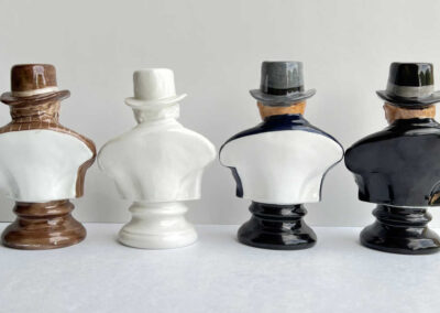 Four Churchill Busts by Michael Sutty: Backs